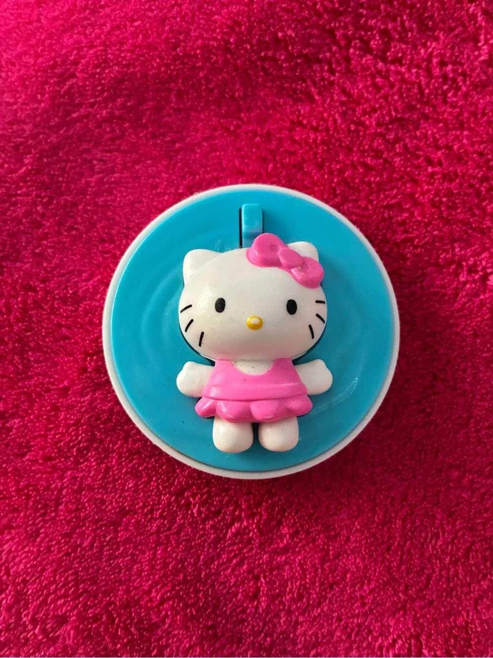 Hello Kitty Bath Toy with Pink Dress and Blue Base